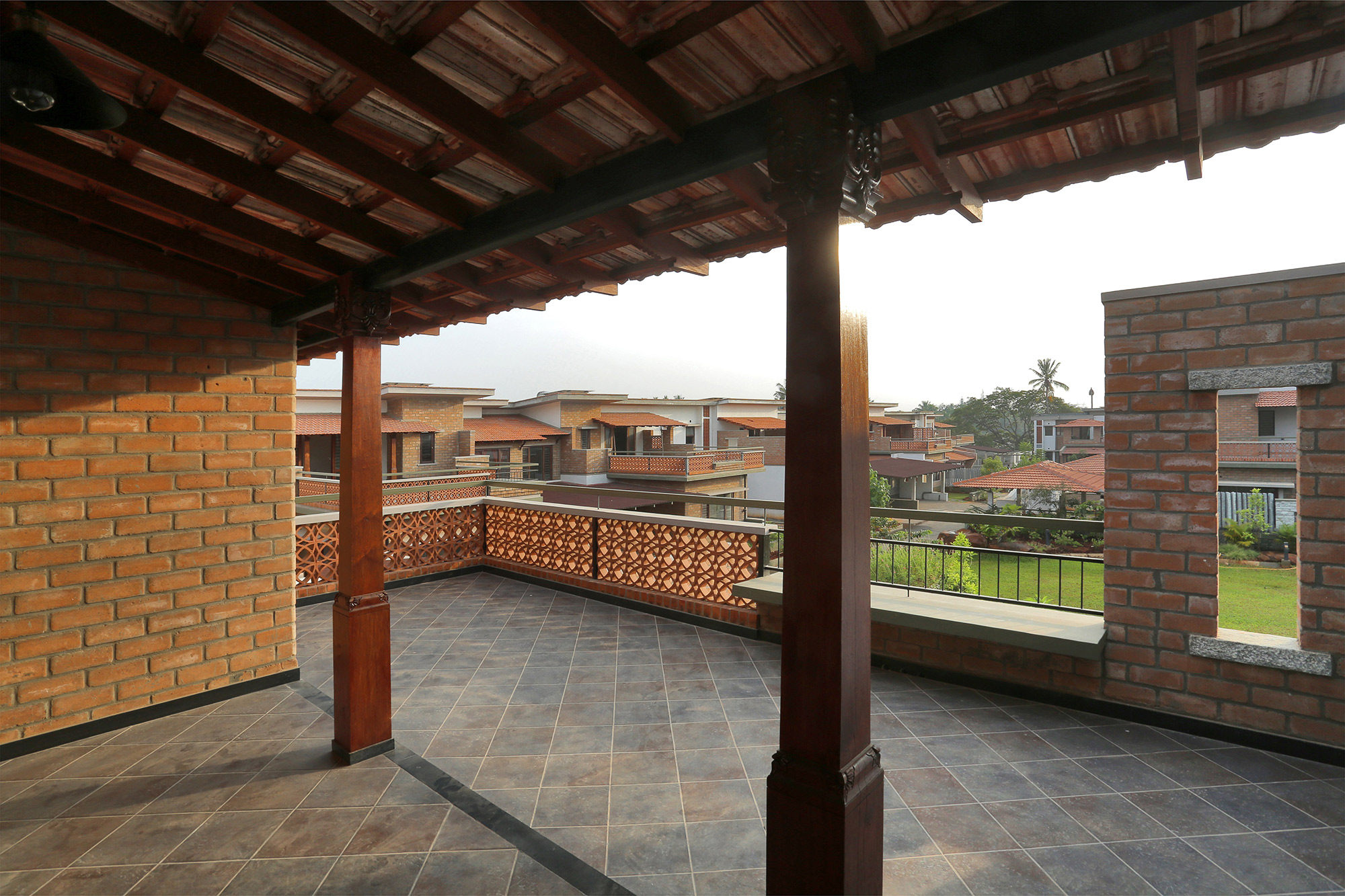 The terrace on the first floor with an interesting parapet wall, to enable better use of the space