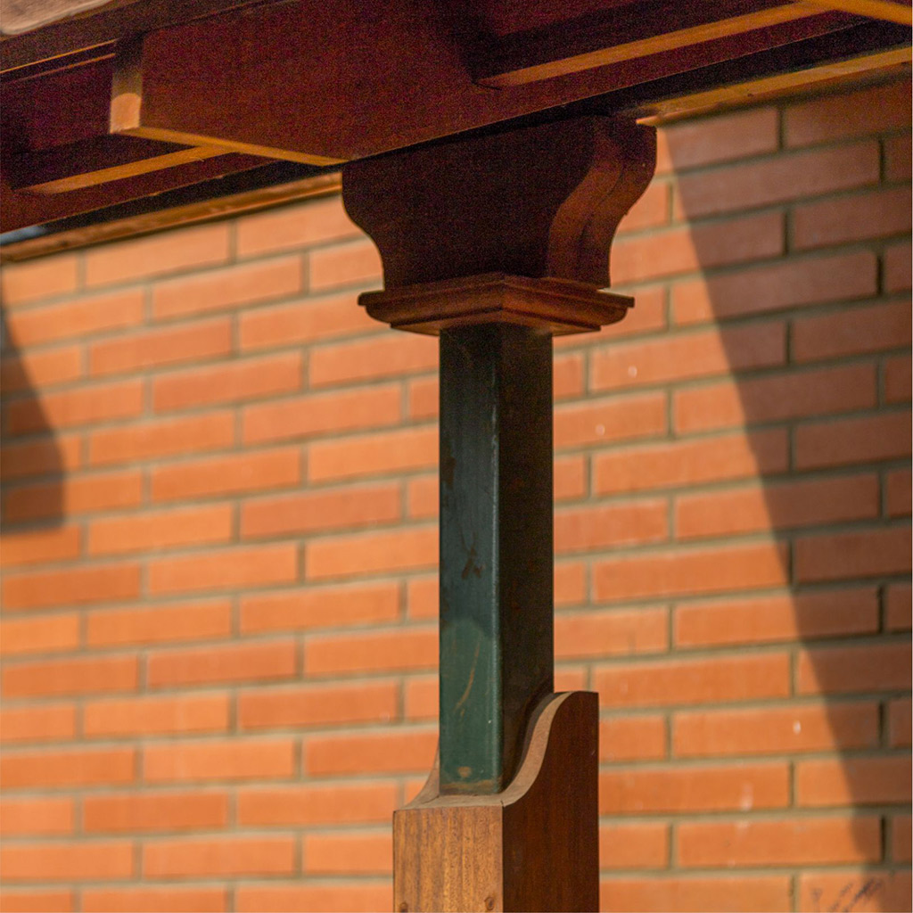 Wood and metal detail in column