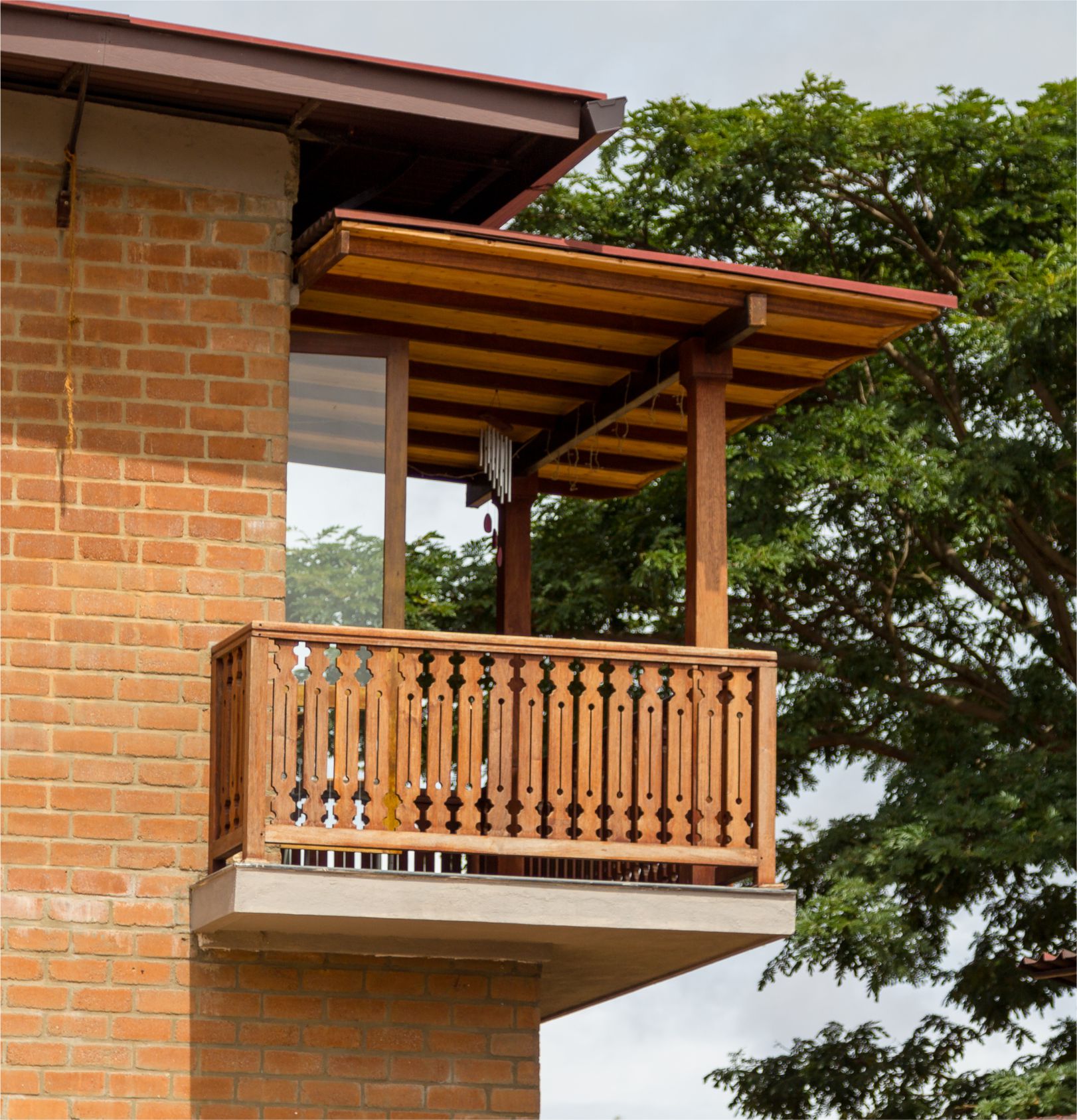 Handcrafted timber balcony railing and roof